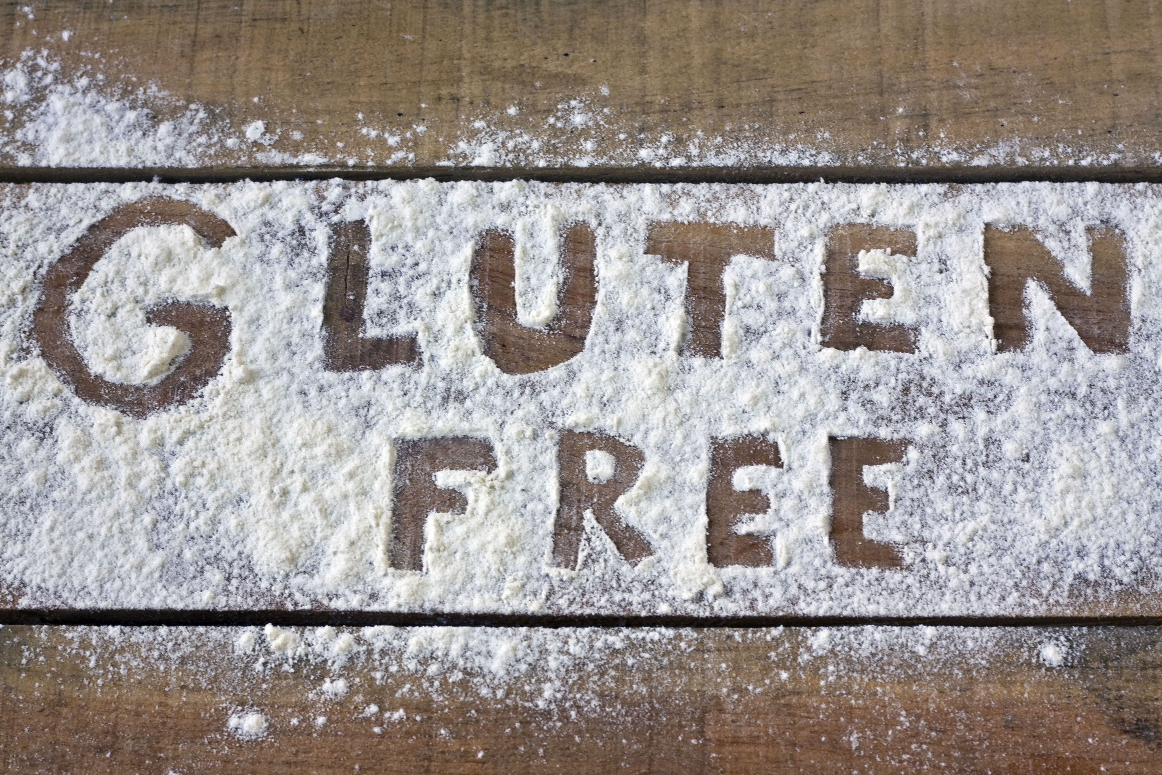 gluten free  word with wood background